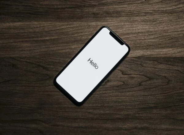 Smartphone with hello text on screen